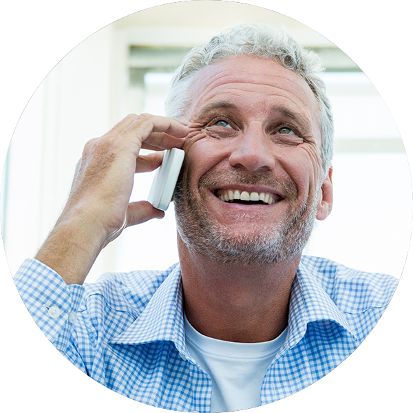 Person talks on mobile phone.