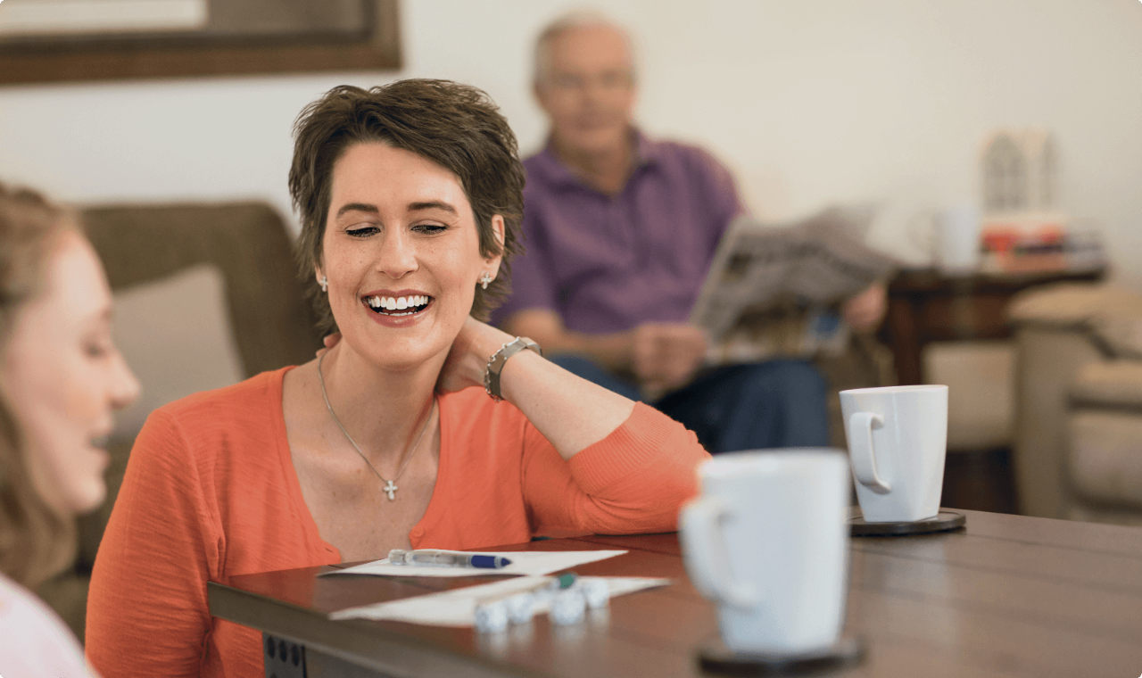 Spinal Cord Stimulation patient Karen at a coffee shop.