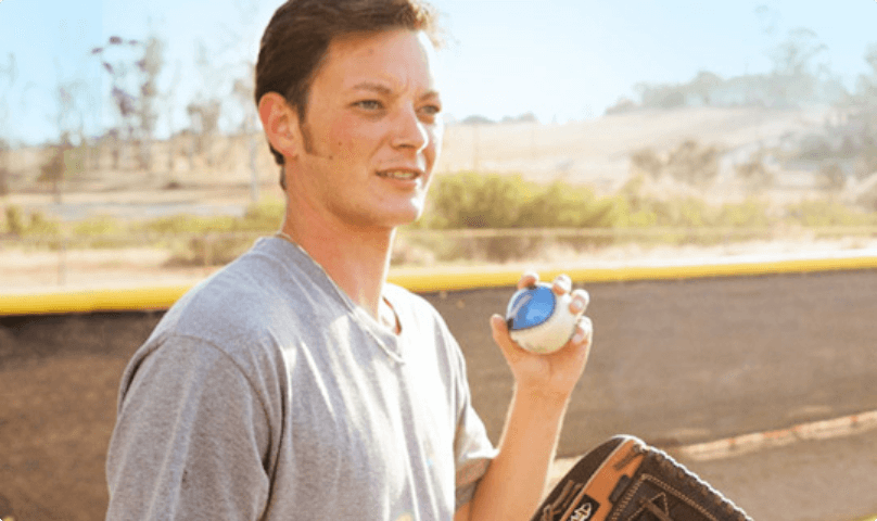 Spinal Cord Stimulation patient Kevin playing baseball.