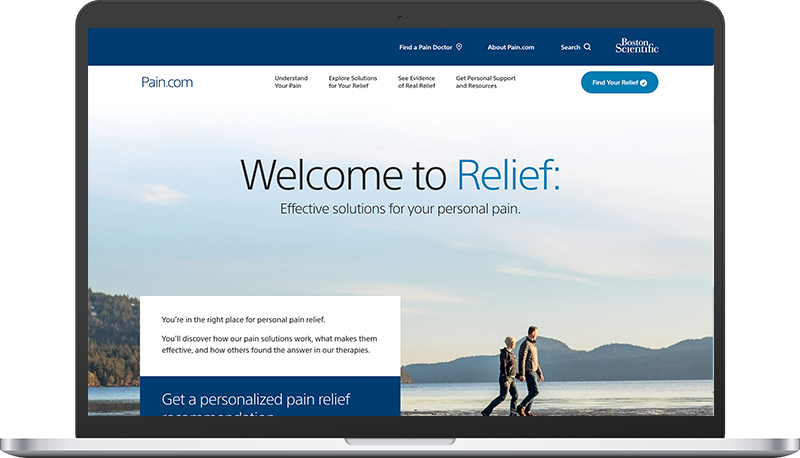 Pain.com homepage on laptop.